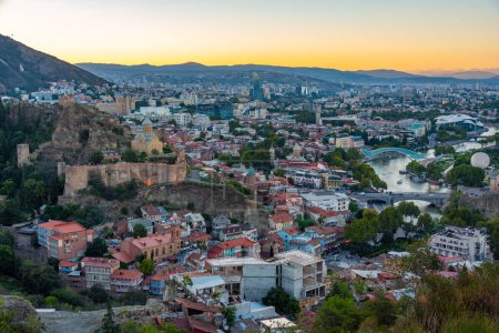 Sunset view of Narikala fortress overlooking downtown Tbilisi in Georgia