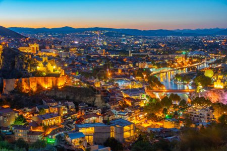 Sunset view of Narikala fortress overlooking downtown Tbilisi in Georgia