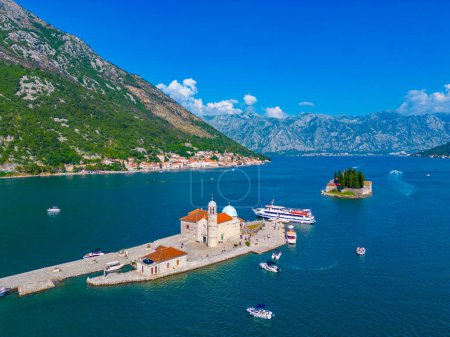 Aerial view of Church of Our Lady of Skrpjela and Saint George Catholic Monastery near Perast in Montenegro