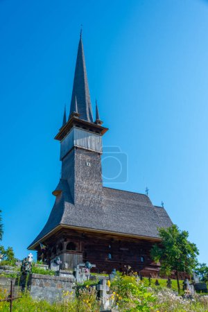 Wooden Church St. Archangels in the village Plopis in Romania