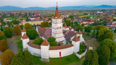 Coucher de soleil sur l'Eglise évangélique fortifiée de Harman, Roumanie