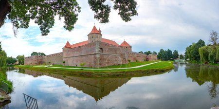 Photo for Fagaras citadel during a cloudy day in Romania - Royalty Free Image