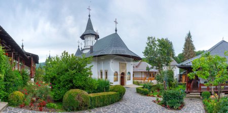 Photo for Sihastria monastery during a cloudy day in Romania - Royalty Free Image