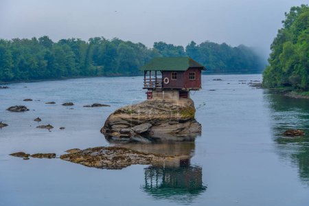 Wooden house on Drina river in Serbia