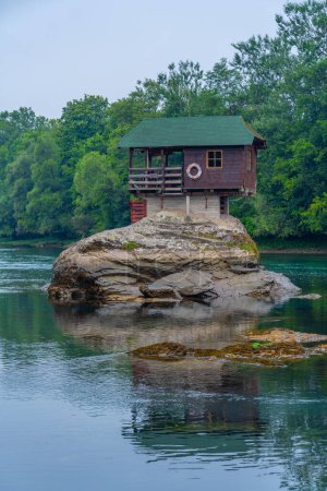 Wooden house on Drina river in Serbia