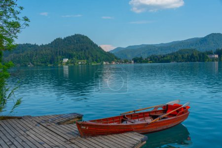 Rowing boat at shore of lake Bled in Slovenia
