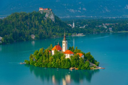 Assumption of Maria church and Bled Castle at lake Bled in Slovenia