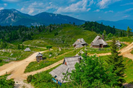 Photo for Wooden huts at Velika Planina mountains in Slovenia - Royalty Free Image