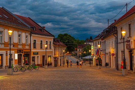 Photo for Novo Mesto, Slovenia, 24 June 2023: Sunset view of the Glavni trg square in Slovenian town Novo Mesto - Royalty Free Image
