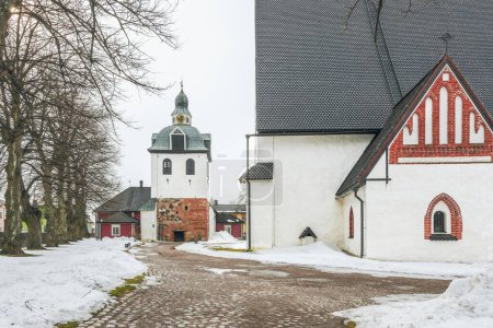 Photo for Porvoo, Finland - April 02, 2009,  The separate belltower of the Medieval Lutheran Cathedral of Porvoo in a winter cloudy day - Royalty Free Image