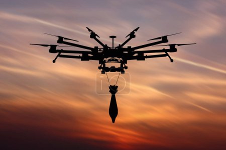 Military drone with a bomb at sunset. Combat drone in military conflicts . Illustrative photo