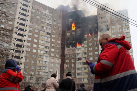 KYIV, UKRAINE - 20240207: Ukrainian rescuers extinguish a fire in a residential building following a missile attack in Kyiv