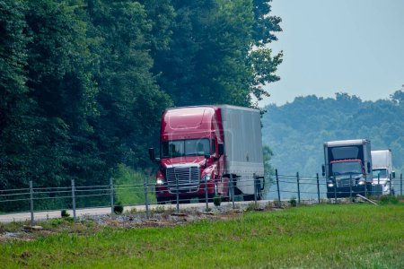 Photo for Horizontal shot of trucks on a Tennessee interstate. - Royalty Free Image
