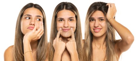 Photo for Collage of same beautiful young women with three different emotions on a white studio background. - Royalty Free Image