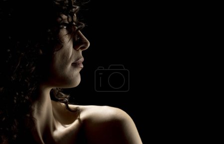 Photo for Sensual Profile Silhouette Portrait on Dark Studio Background - Royalty Free Image