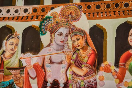 Photo for PUSHKAR, INDIA - MARCH 3 2018: Radha Krishna colorful wall painting at the temple street wall. - Royalty Free Image