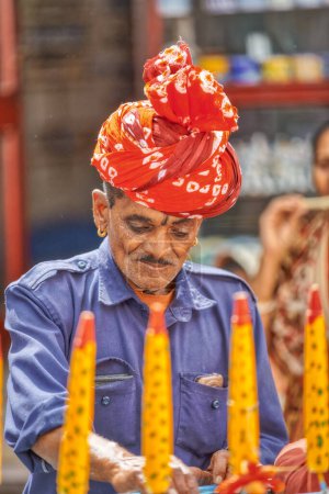 Photo for PUSHKAR, INDIA - MARCH 3 2018: Colorful scene of ice cream seller on the street of the Holy City. - Royalty Free Image