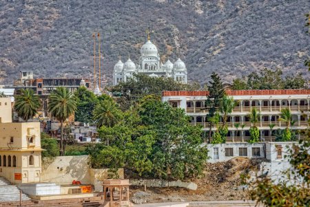 Photo for PUSHKAR, INDIA - MARCH 3 2018: Beautiful view from the house terrace to the sikh temple Gurudwara Sahib. - Royalty Free Image