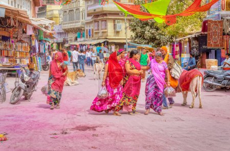 Photo for PUSHKAR, INDIA - MARCH 3 2018: Colorful scene of beautiful people on the street of the Holy City. - Royalty Free Image