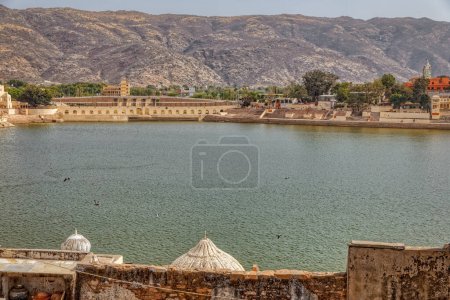 Photo for PUSHKAR, INDIA - MARCH 3 2018: Beautiful view from the house terrace to the holly lake. - Royalty Free Image