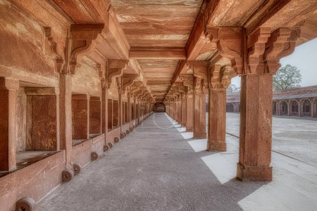 Photo for FATEHPUR SIKRI, INDIA - MARCH 4 2018: Colonnaded stables remains of Lower Haramsara at Panch Mahal in Uttar Pradesh. - Royalty Free Image