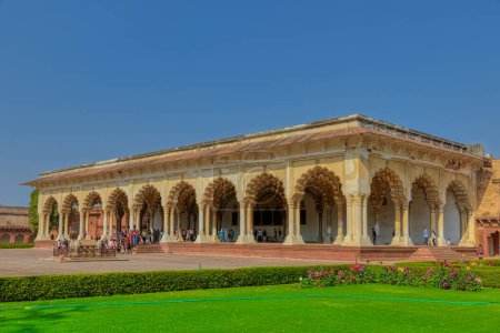 Photo for AGRA, INDIA - MARCH 4 2018: Visitors sightseeing historical remains of public hall Diwan-i-Am of Agra Fort UNESCO World Heritage Site also known as Lal Qila and Fort Rouge. - Royalty Free Image