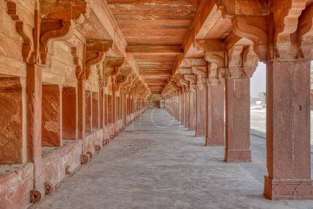 Photo for FATEHPUR SIKRI, INDIA - MARCH 4 2018: Colonnaded stables remains of Lower Haramsara at Panch Mahal in Uttar Pradesh. - Royalty Free Image