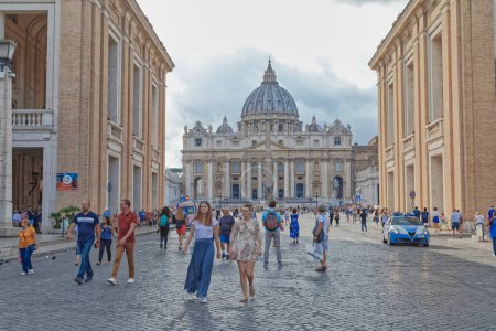Photo for ROME, ITALY - September 26, 2019 Visitors sightseeing St. Peter Basilica at St. Peter Square in Vatican city. - Royalty Free Image