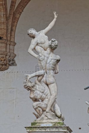 Photo for FLORENCE, ITALY - September 25, 2019 Rape of the Sabine Women by the Flemish artist Jean de Boulogne in Loggia dei Lanzi at the Piazza della Signoria. - Royalty Free Image