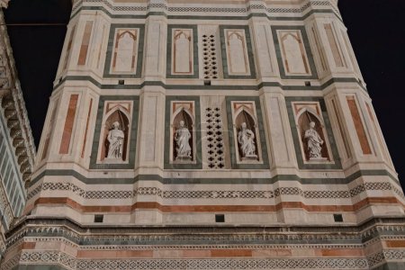 Photo for Tower detail of the Duomo Cathedral of Santa Maria del Fiore in Florence Italy by night. - Royalty Free Image