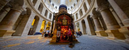Photo for JERUSALEM, ISRAEL - JUNE 19, 2015: Extremely wide lens shot of the people make pilgrimages to the Rotunda containing Christs tomb in Church of the Holy Sepulchre. Chapel of the Copts in the front. - Royalty Free Image