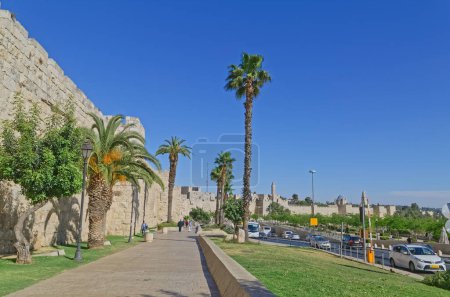 Photo for JERUSALEM, ISRAEL - MAY 18, 2016: People are walking along western edge of the Old City to and from the Jaffa Gate. - Royalty Free Image