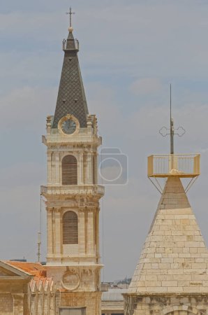 Photo for The top of the tower of the sacred building, roofs of old city Jerusalem, Israel. - Royalty Free Image