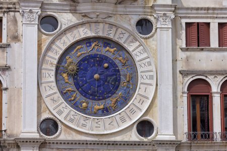 Photo for Close-up of Zodiac sign, moon phase and time on Clock Tower at St. Marks Square in Venice, Italy - Royalty Free Image