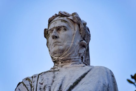 Photo for PADUA, ITALY - APRIL 01 2023: Sandstone statue of Francesco Petrarca, a Renaissance poet and scholar, standing proudly on Petrarca square. - Royalty Free Image
