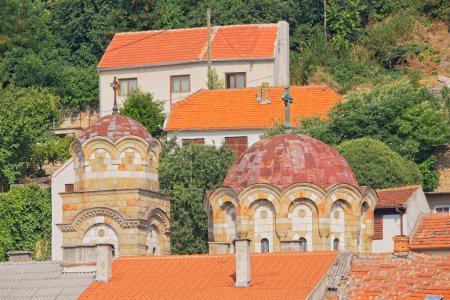 Photo for KNIN, CROATIA - August 5, 2018: Close-up zoom-out view showcasing the roof, tower, and dome of the Church of the Intercession of the Holy Virgin. - Royalty Free Image
