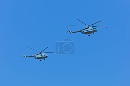 Photo for KNIN, CROATIA - August 5, 2018: Close-up of two Mil Mi-8 helicopters during the celebration of Operation Storm military parade. - Royalty Free Image
