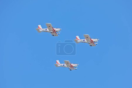 Photo for KNIN, CROATIA - August 5, 2018: Three aircraft from the Krila Oluje aerobatic team during Operation Storm celebration. - Royalty Free Image