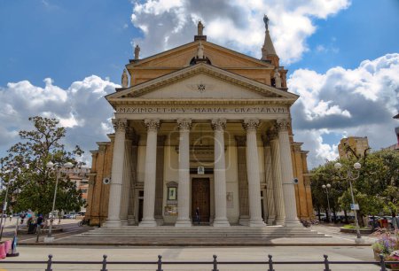 Photo for SAN DONA DI PIAVE, ITALY - July 28, 2023: Striking view of Parish Cathedral Duomo di Santa Maria delle Grazie from Corso Silvio Trentin. - Royalty Free Image