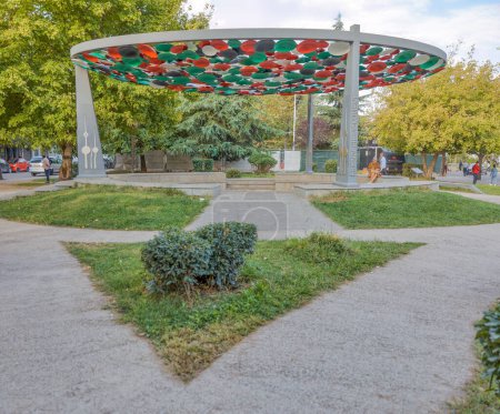 Photo for TIRANA, ALBANIA - September 30, 2019: The Friendship Monument in Tirana city center showcasing a colorful circular arch filled with multicolored discs. - Royalty Free Image