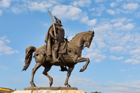 Photo for TIRANA, ALBANIA - September 30, 2019: Bronze statue of Skenderbeg on horseback in the main square of the city center. - Royalty Free Image