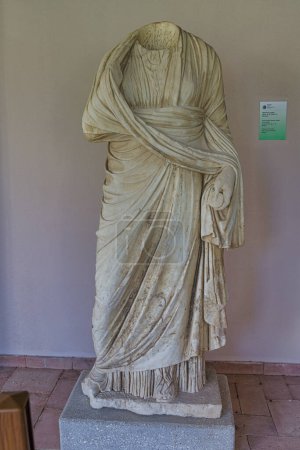 Photo for APOLLONIA, ALBANIA - October 20, 2022: An ancient Roman era statue of a woman sculpted from marble stands timeless, embodying the rich history of Apollonia. - Royalty Free Image