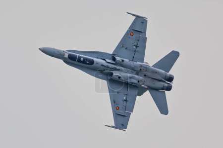 Photo for VARAZDIN, CROATIA - July 21, 2018: A Spanish Air Force EF-18A Hornet jets across the sky during the Varazdin airshow. - Royalty Free Image