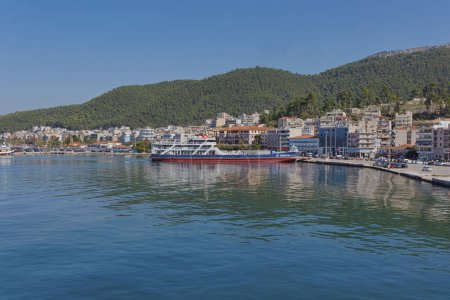 Photo for IGOUMENITSA, GREECE - October 23, 2023: The bustling port of Igoumenitsa is captured in the calm of a sunny day, with ferries ready to embark on their voyages. - Royalty Free Image