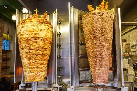 Téléchargez les photos : Kebab grilled heater. Roast meal. Street food in Istanbul. Turkey - en image libre de droit