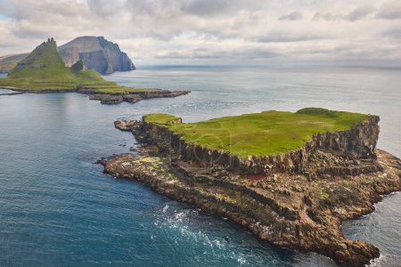 Photo for Faroe islands dramatic coastline viewed from helicopter. Vagar area - Royalty Free Image