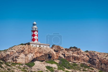 Photo for Picturesque lighthouse in Cabrera island, Balearic archipelago. Mediterranean coastline. Spain - Royalty Free Image
