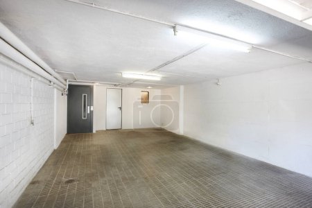 Photo for Private parking place interior. Residential garage indoor with lift. Nobody - Royalty Free Image