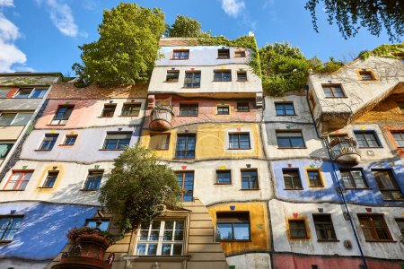 Photo for Picturesque multicolored facade in Vienna. Hunderwasser residential house. Austria - Royalty Free Image