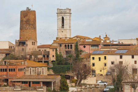 Photo for Traditional baix emporda village of Cruilles. Tower and church. Girona - Royalty Free Image
